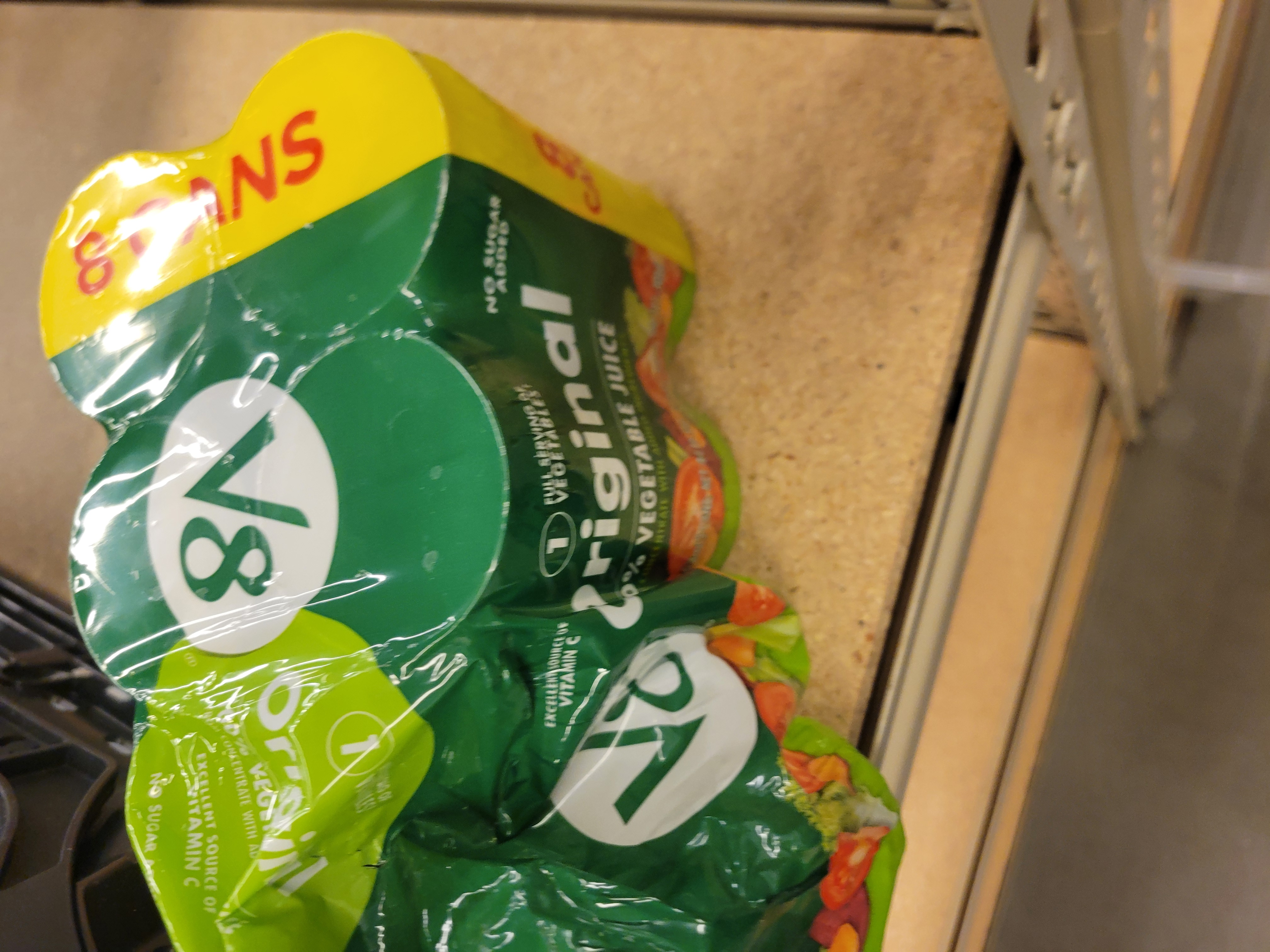 Various food items on a green cart.